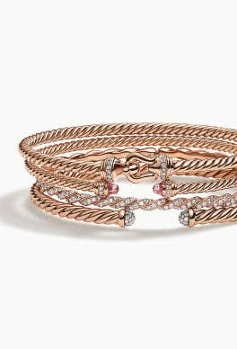 David Yurman cable bracelets in rose gold.